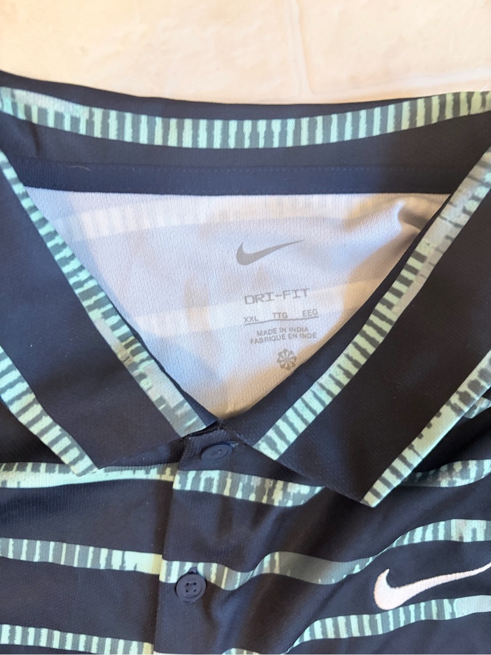 Nike Men’s Black Polo with Teal Stripe Pattern - Picture 3 of 3